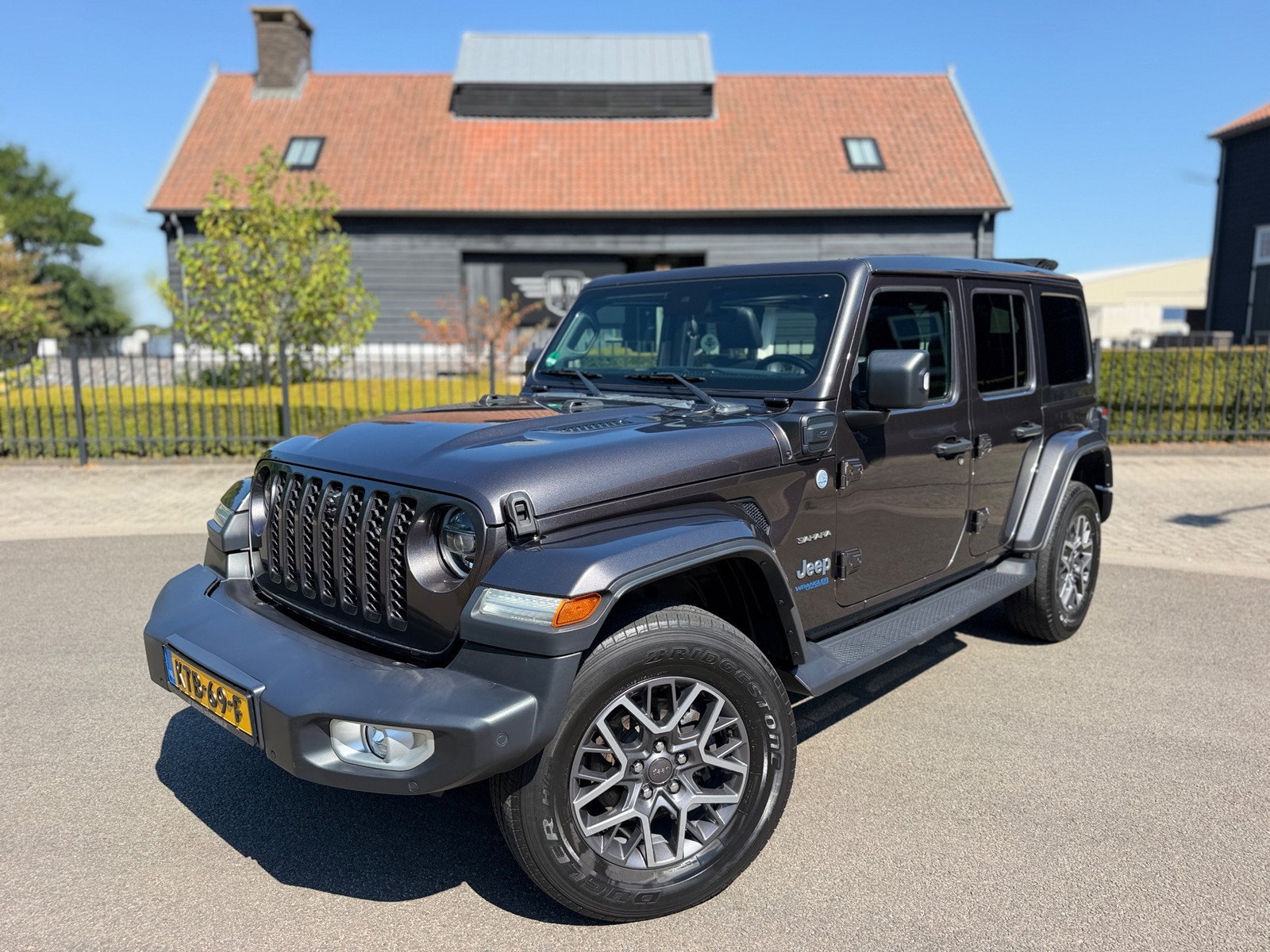 Jeep Wrangler UNLIMITED Jeep Wrangler 380 Sahara 2.0 PHEV Softtop AWD 4x4 Leer Navi Led-Xenon
